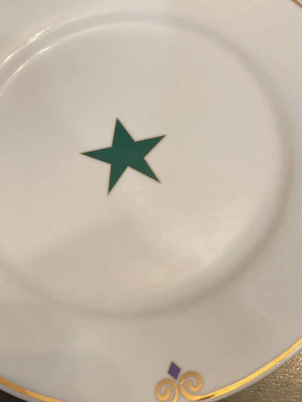 Pier 1 White  Plates with Multicolor Star Accents and Gold Trim